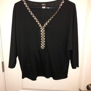Black top with rhinestone detail